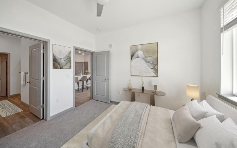 Bedroom with natural lighting and high ceilings at Ascend at Pena Station