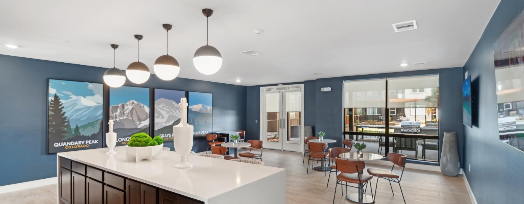 a community lounge with ample light at Ascend at Pena Station