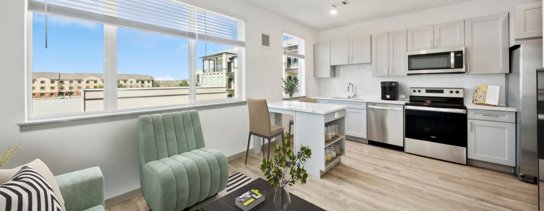Open space living area with natural lighting at Ascend at Pena Station